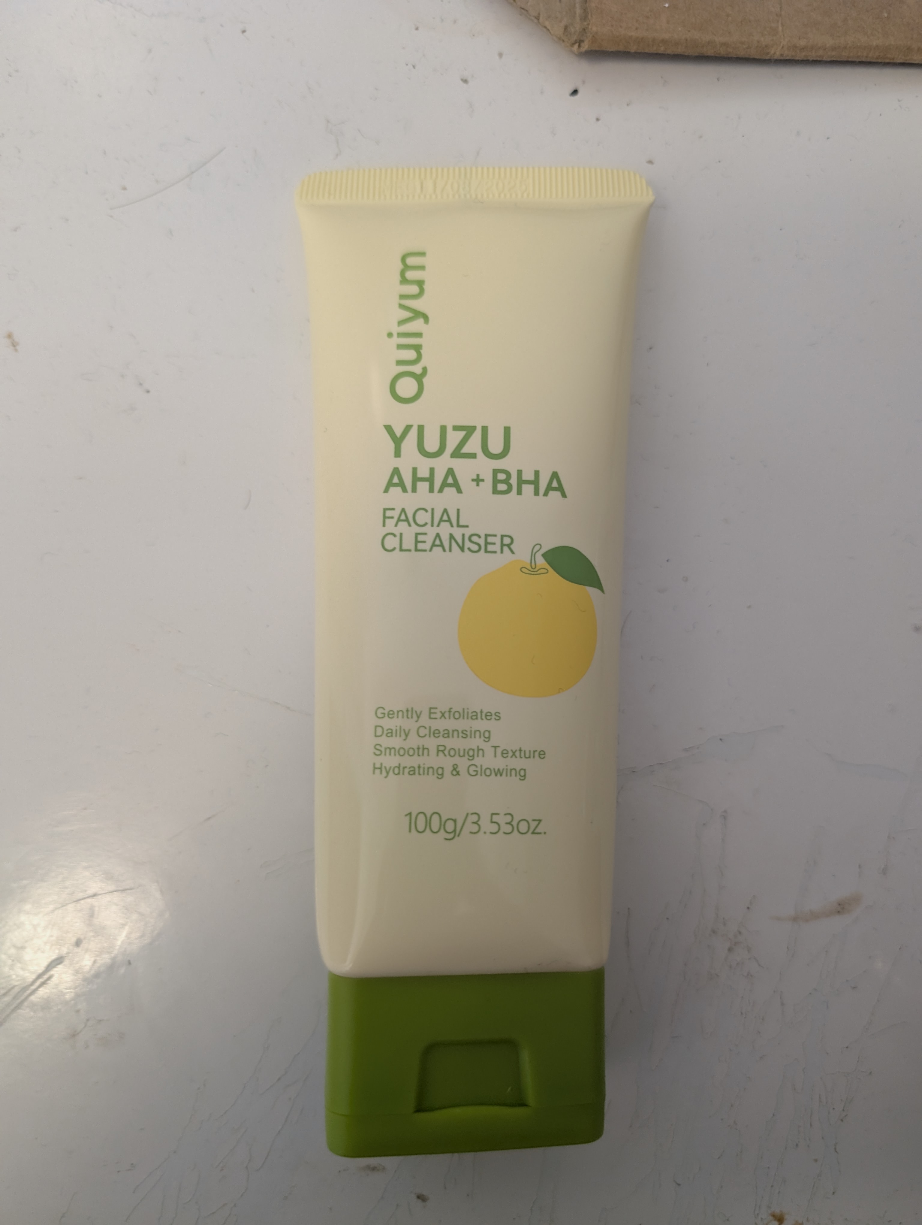 Product photo of a facial cream jar